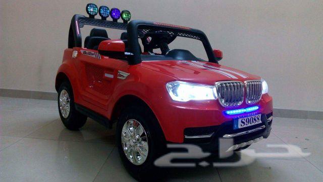 سيارة أطفال BMW كفرات نفخ ودفع رباعي