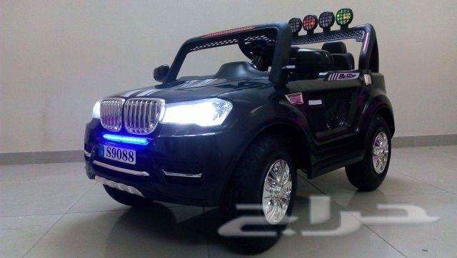 سيارة أطفال BMW كفرات نفخ ودفع رباعي